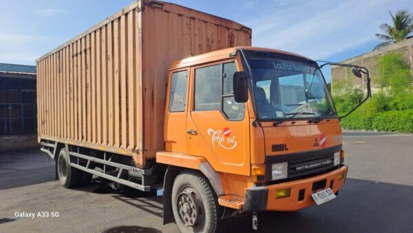 Truck Logistik Mitsubisi Fuso SMS